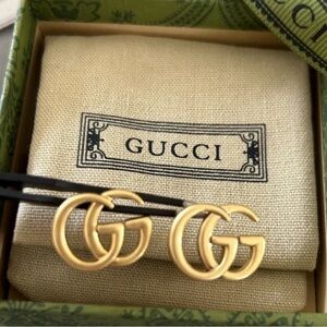 Pre loved gold plated stainless Gucci double G stud earrings